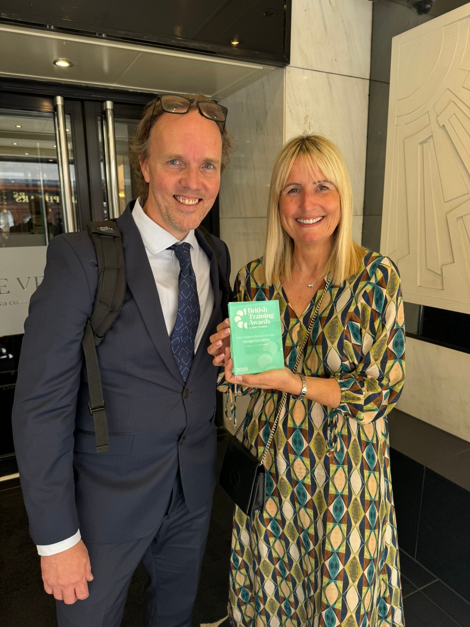 Tracy and Tim with award